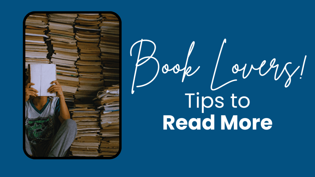 A person sitting cross-legged in front of a towering wall of stacked books, holding an open book in front of their face. Graphic text reads “Book Lovers! Tips to Read More.”